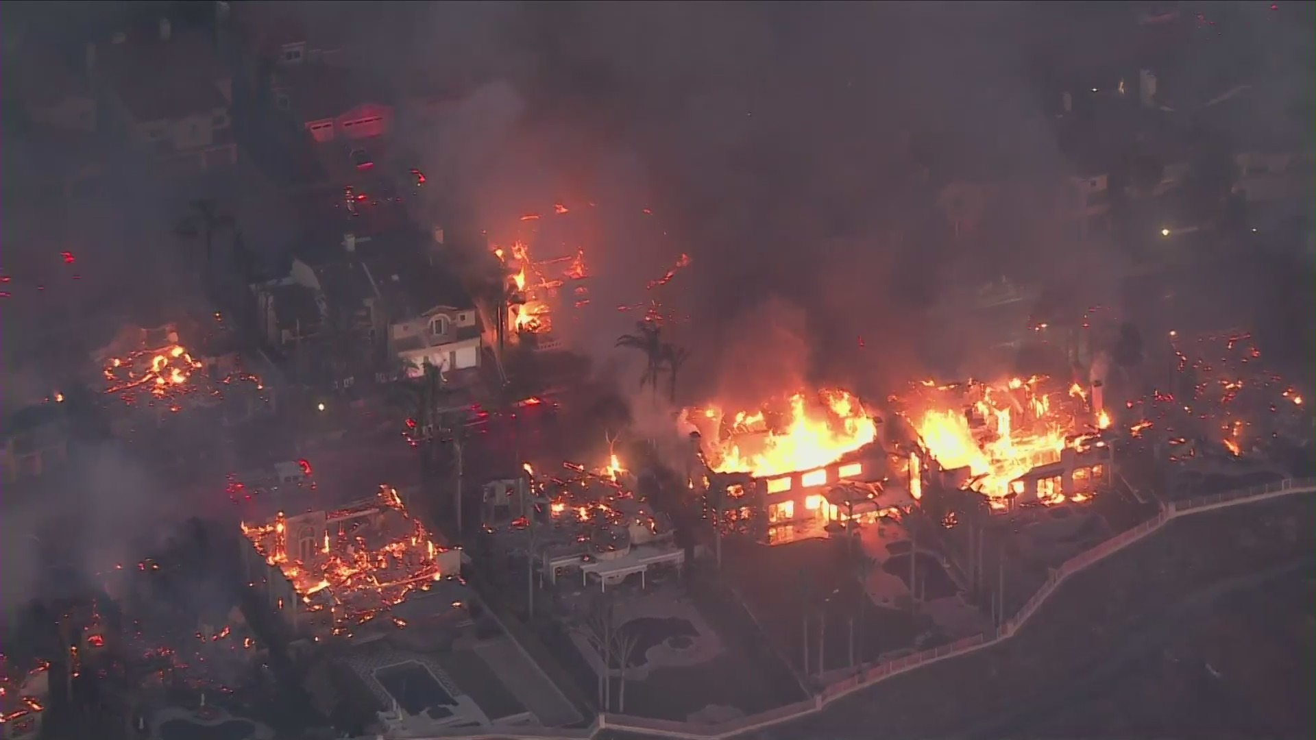 Fire officials estimate more than a dozen homes were destroyed by the Coastal Fire burning in Laguna Niguel on Wednesday, May 11, 2022 (KTLA)