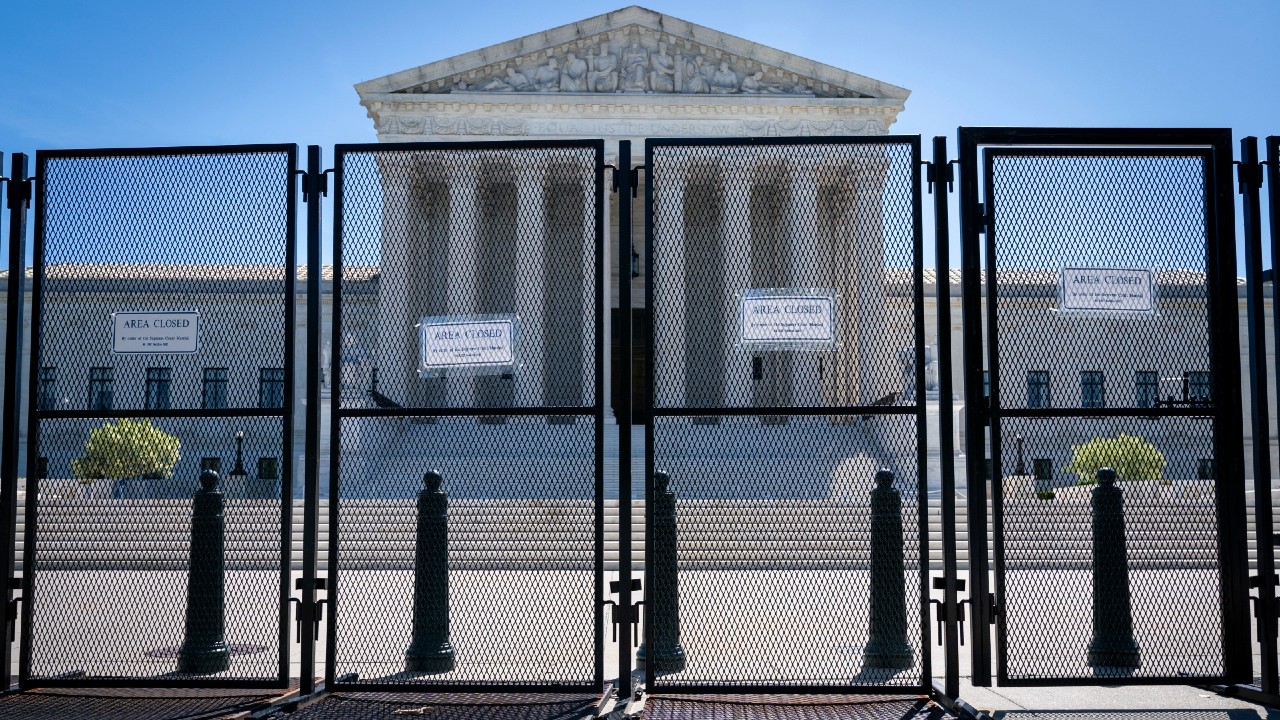 Anti-scaling fencing blocks off the stairs to the Supreme Court, Tuesday, May 10, 2022, in Washington. (AP Photo/Jacquelyn Martin)