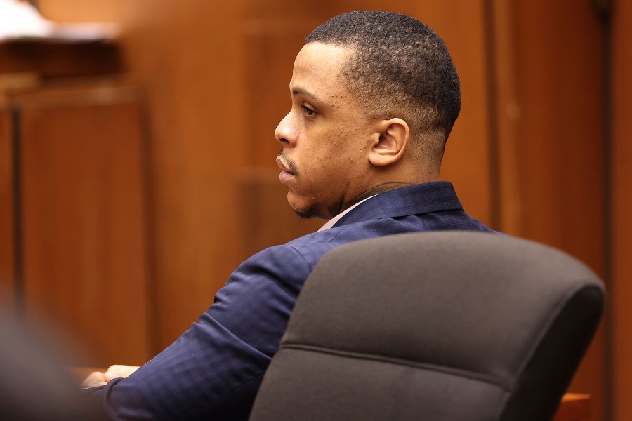 Defendant Eric Holder listens during opening statements in his murder trial on June 15, 2022, at Los Angeles Superior Court in Los Angeles. (Frederick M. Brown/Daily Mail.com via AP, Pool)