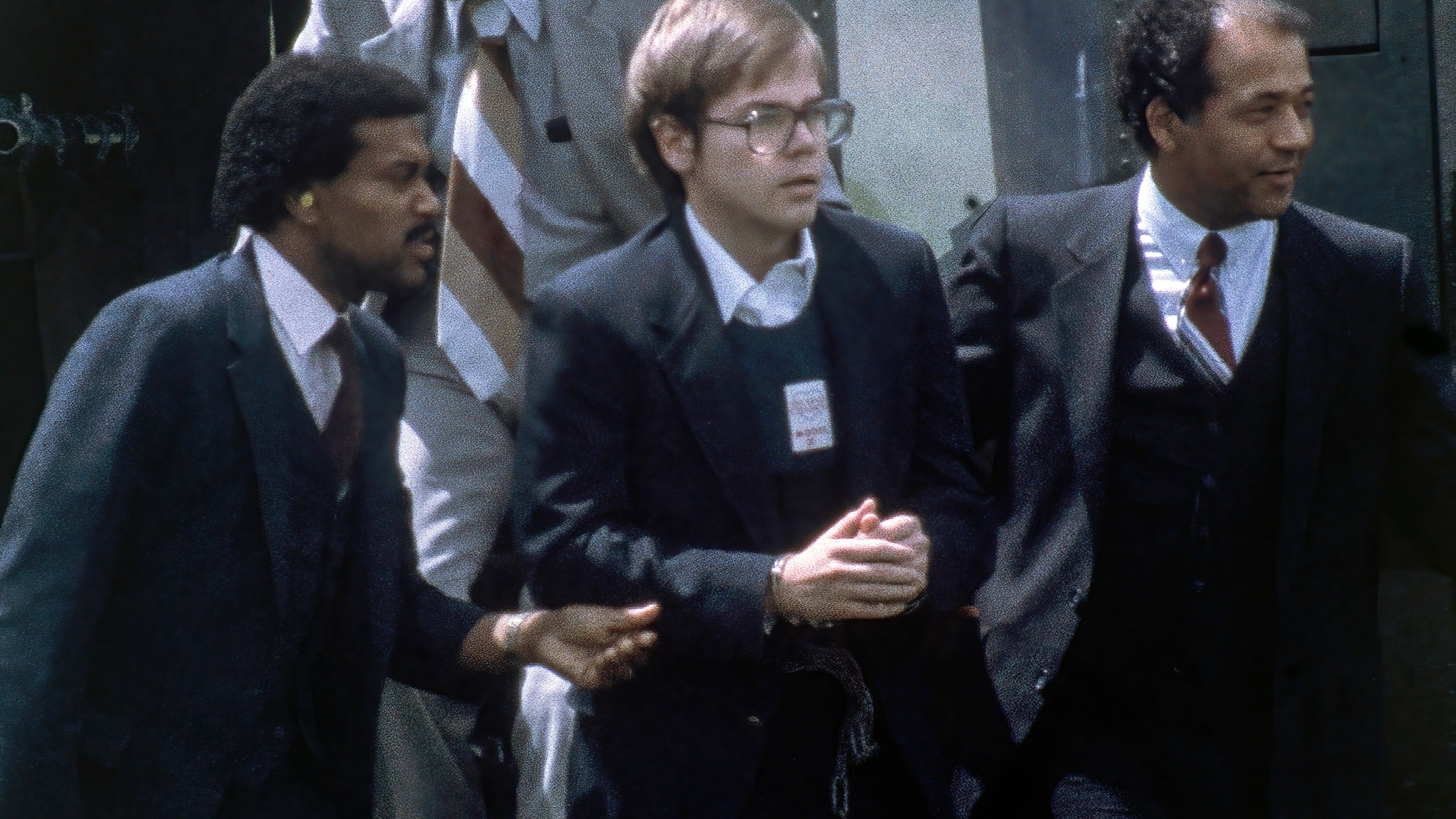 U.S. Marshals escort John Hinckley Jr. as he returns to a marine base via helicopter in Quantico, Va., Aug. 8, 1981. (Barry Thumma/Associated Press)