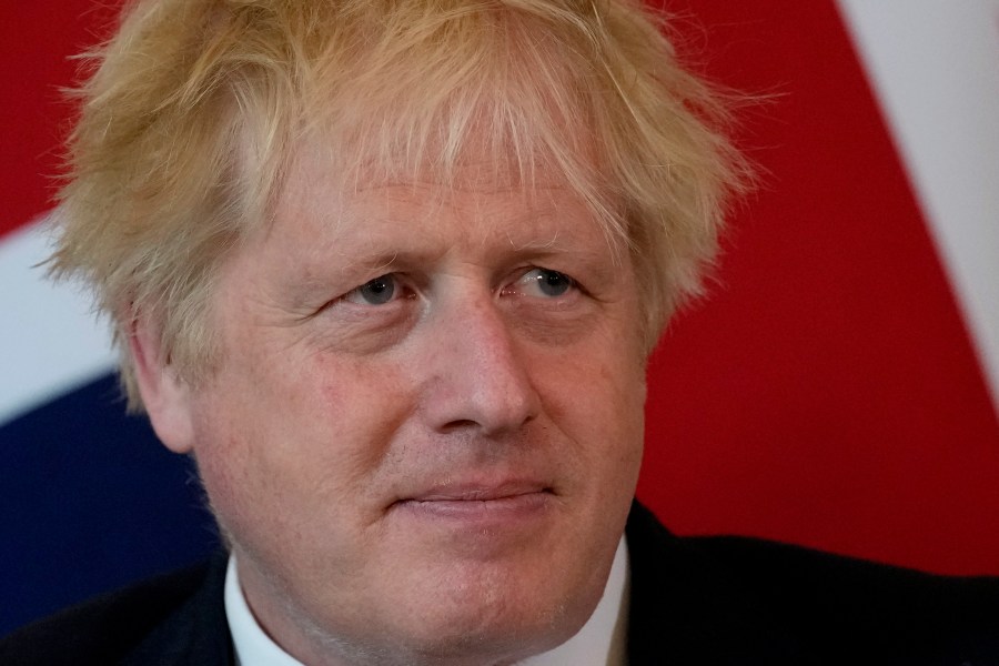 British Prime Minister Boris Johnson listens to the Amir of Qatar Sheikh Tamim bin Hamad Al Thani speak at the start of their meeting inside 10 Downing Street, in London on May 24, 2022. (Matt Dunham, Pool/AP)