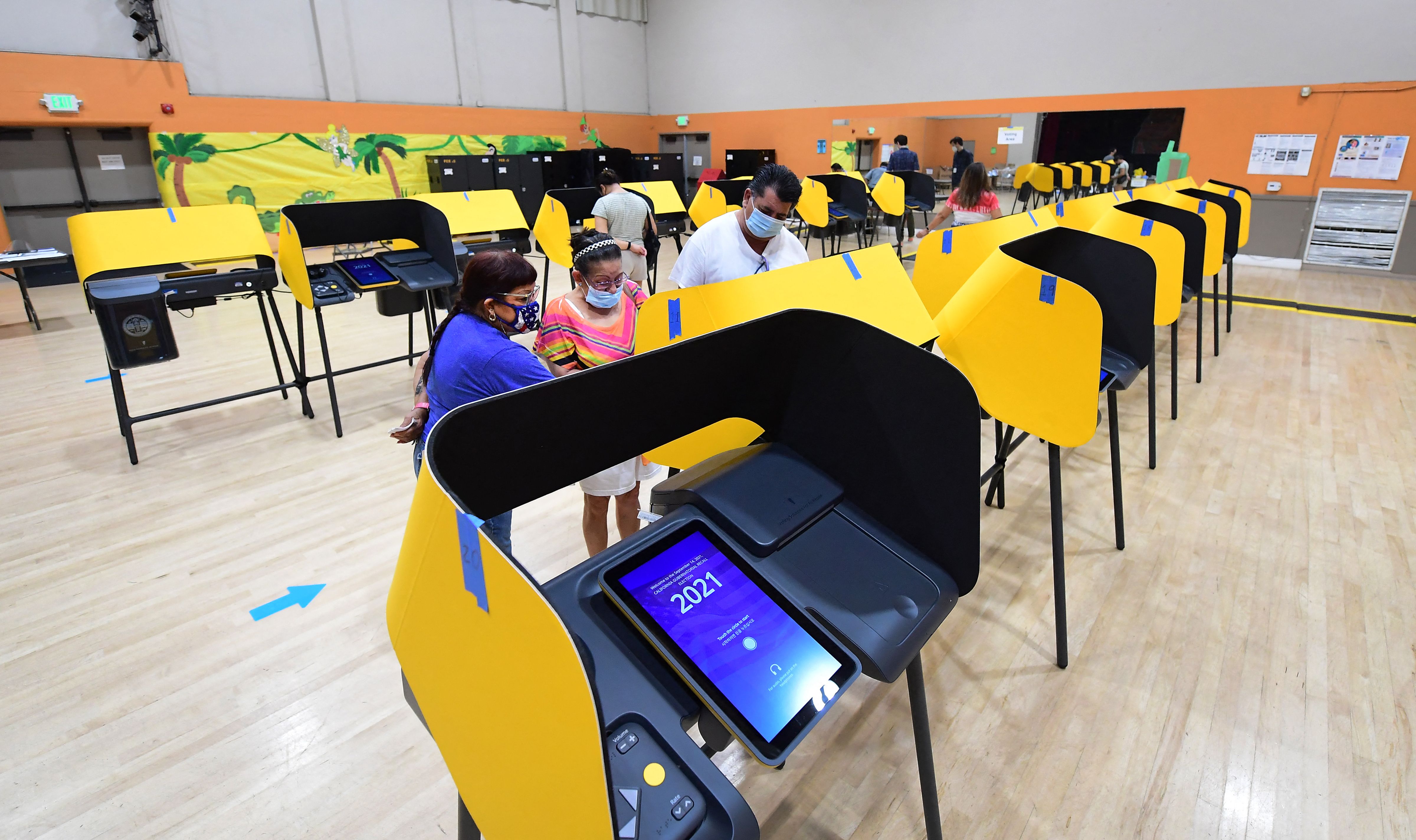 People vote at the Lincoln Park Senior Center in Los Angeles on Sept. 13, 2021. (FREDERIC J. BROWN/AFP via Getty Images)