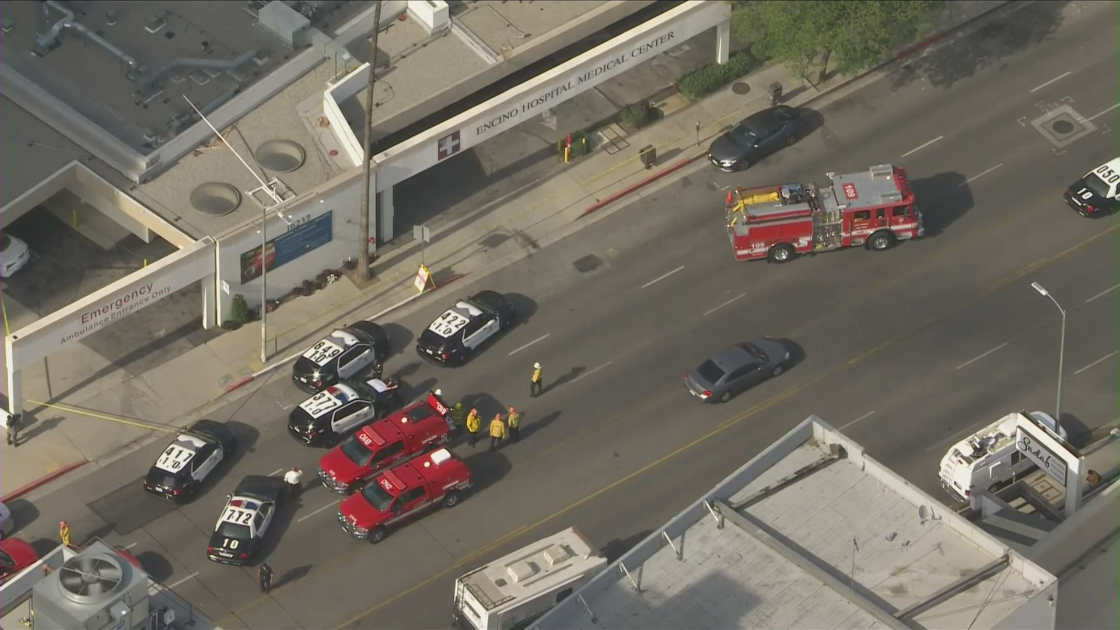 L.A. police and fire officials respond to a triple stabbing at Encino Hospital Medical Center on June 3, 2022. (KTLA)