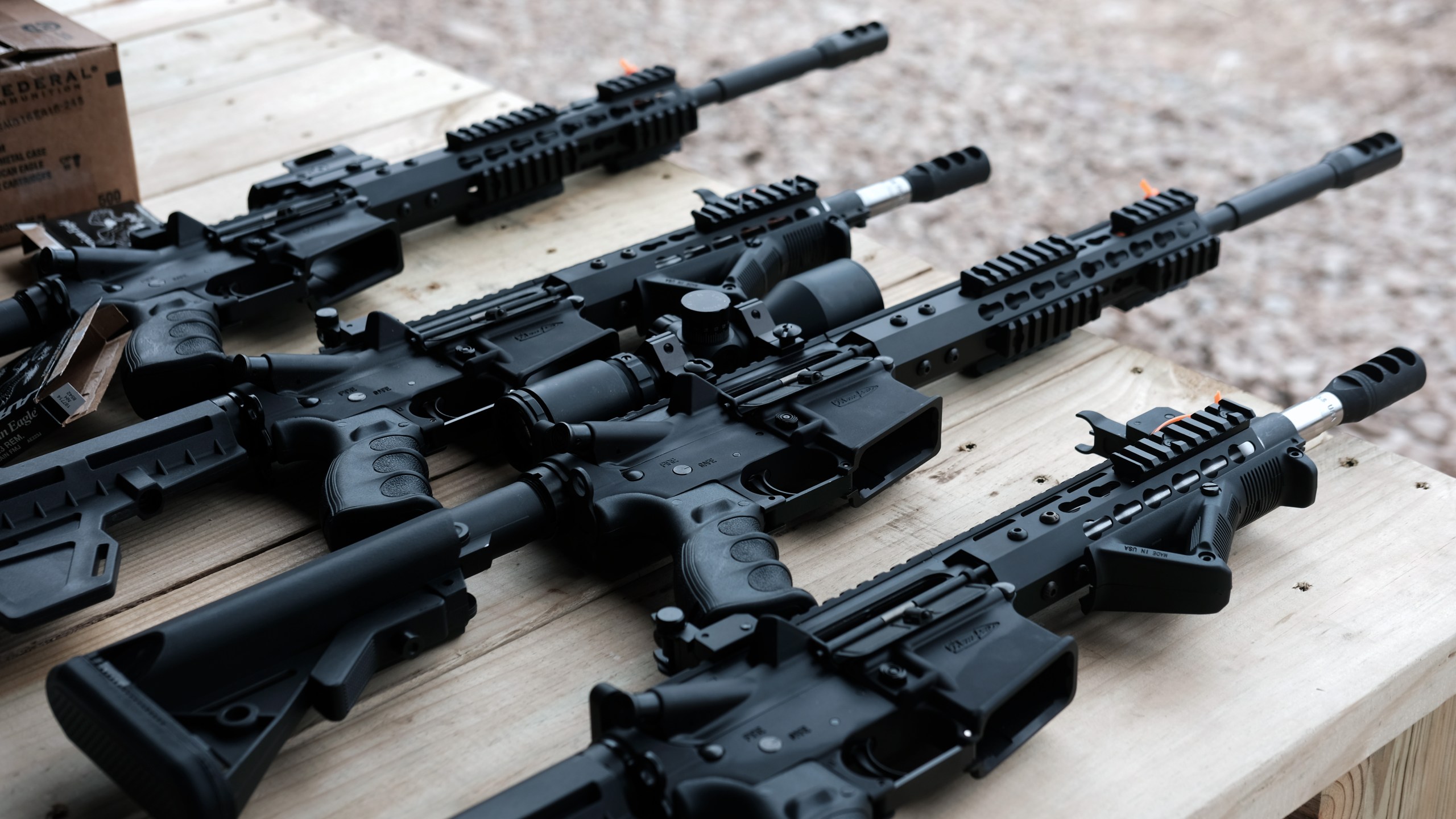 AR-15 rifles and other weapons are displayed on a table at a shooting range during the “Rod of Iron Freedom Festival” on Oct. 12, 2019 in Greeley, Pennsylvania. (Spencer Platt/Getty Images)