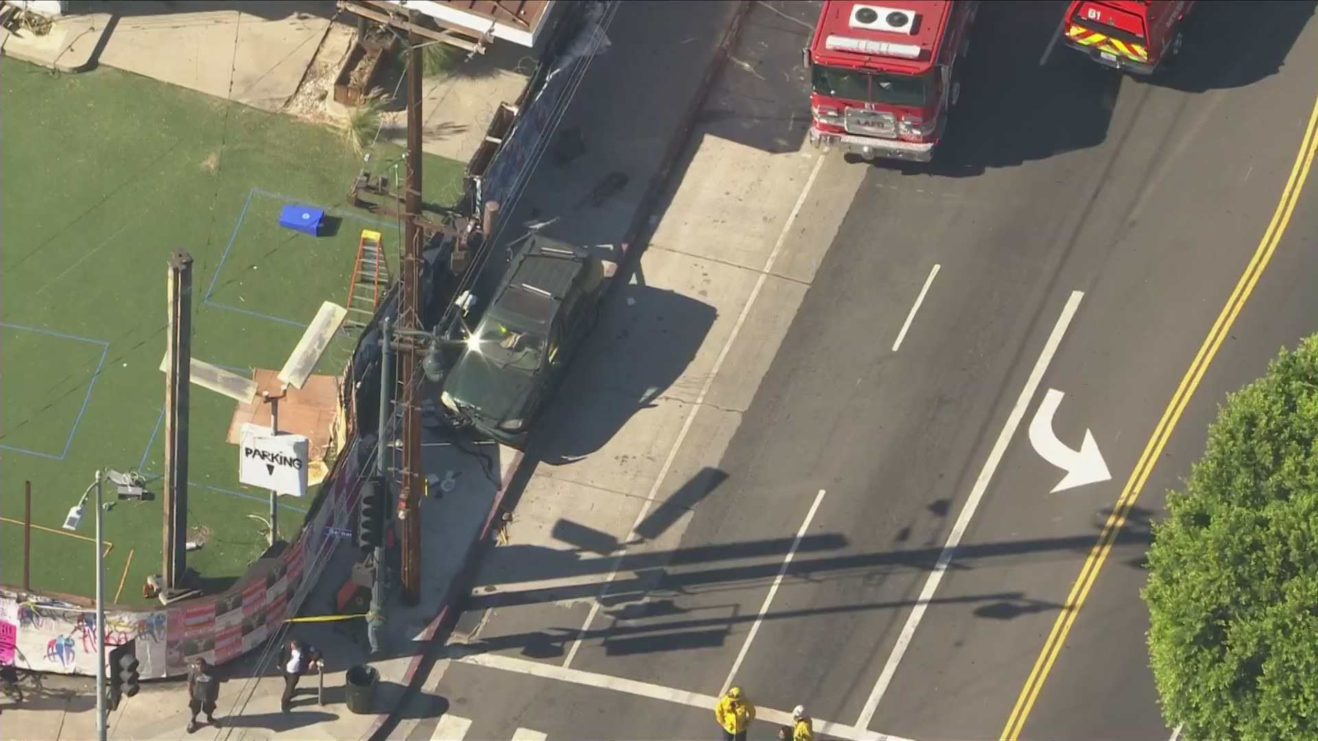 A person is dead and another was hurt as a car struck a bus stop in Elysian Park on July 13, 2022. (KTLA)