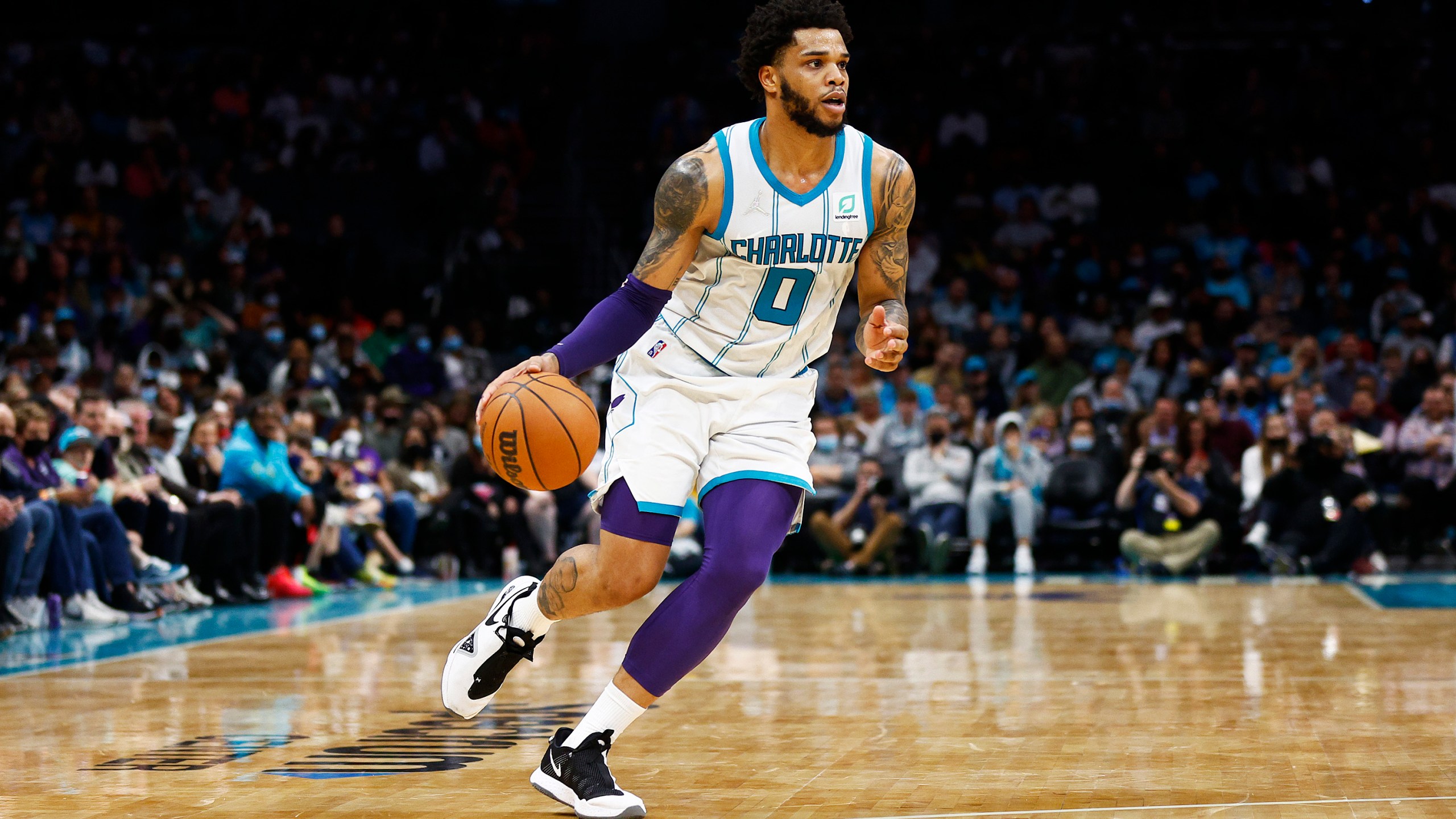 Miles Bridges #0 of the Charlotte Hornets dribbles the ball in the fourth quarter of the game against the Toronto Raptors at Spectrum Center on Feb. 25, 2022 in Charlotte, North Carolina. (Jared C. Tilton/Getty Images)