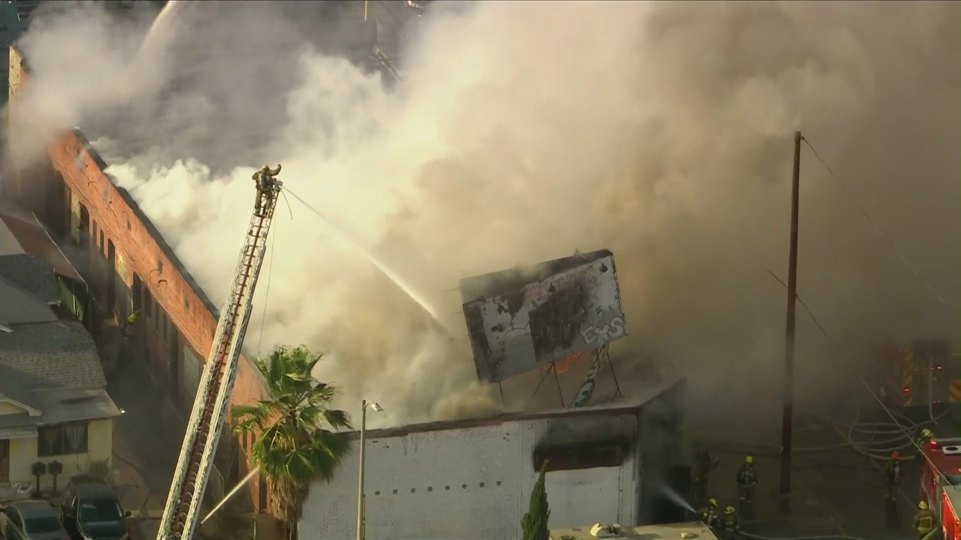 A commercial building in South L.A. caught fire on July 24, 2022. (KTLA)