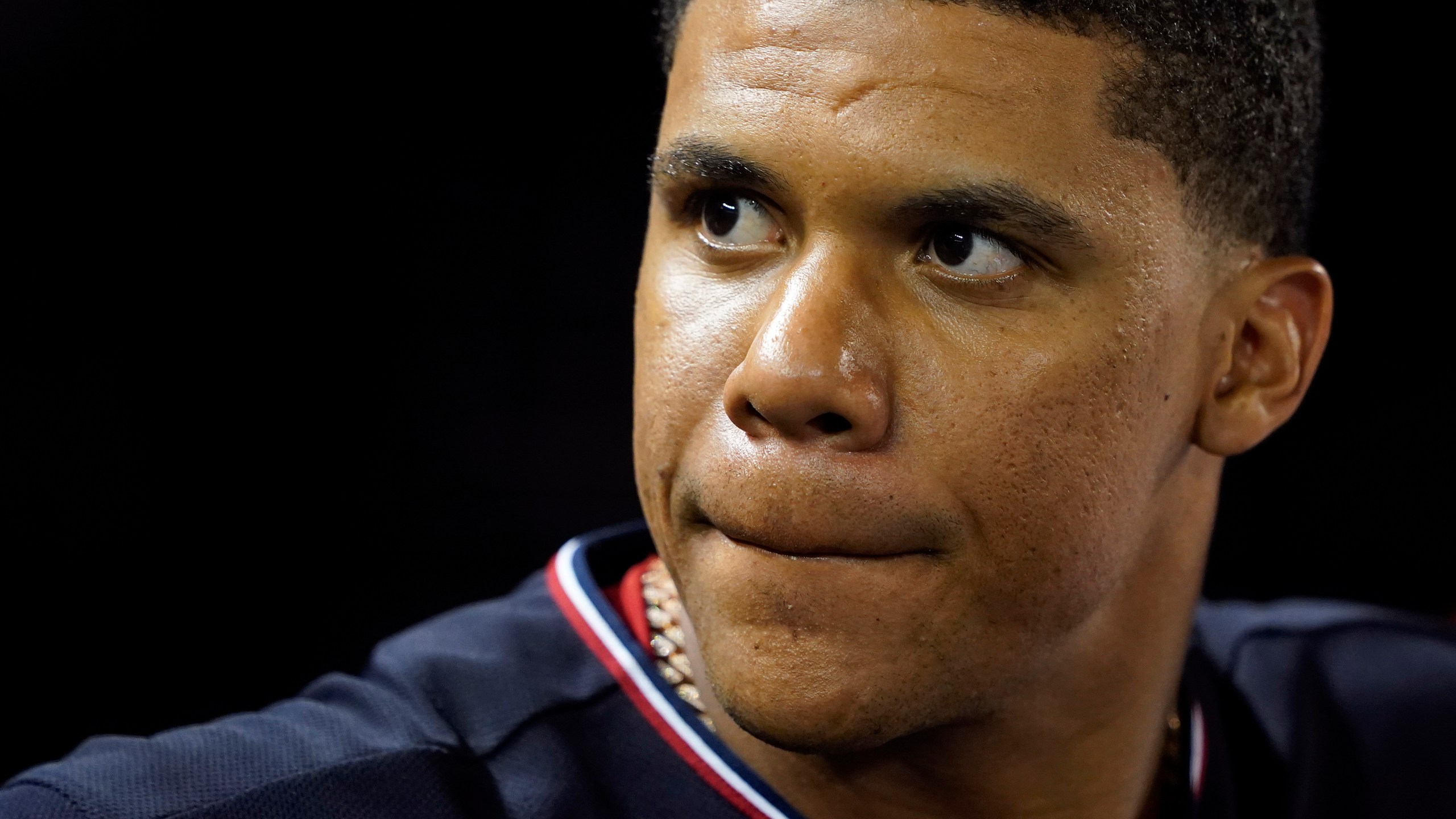 Washington Nationals' Juan Soto stands in the dugout in the seventh inning of a baseball game against the St. Louis Cardinals on July 29, 2022 in Washington. (Patrick Semansky/Associated Press)