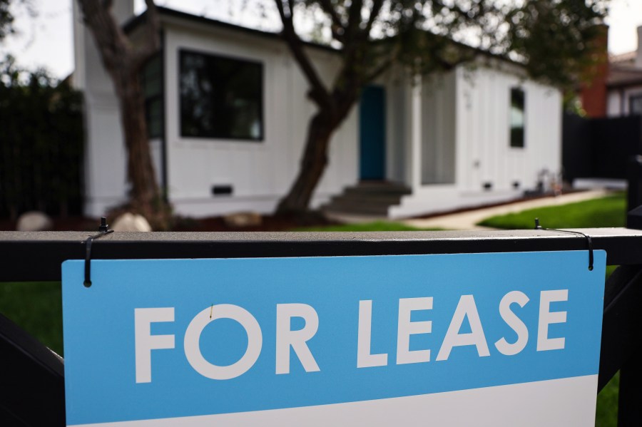 A "For Lease" sign is posted outside a house available for rent on March 15, 2022 in Los Angeles, California. Single-family rental home prices are soaring and increased a record 12.6 percent in January compared to the previous year, according to new data from CoreLogic. (Photo by Mario Tama/Getty Images)