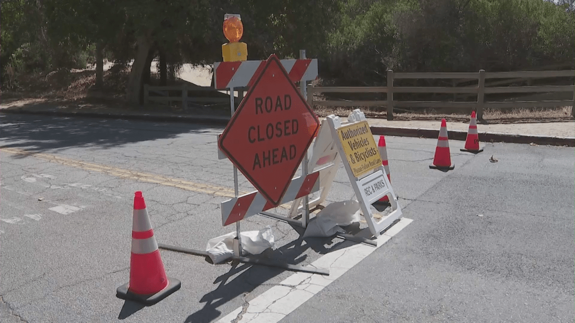 A sign showing a road closure in Griffith Park is seen on Aug. 18, 2022. (KTLA)