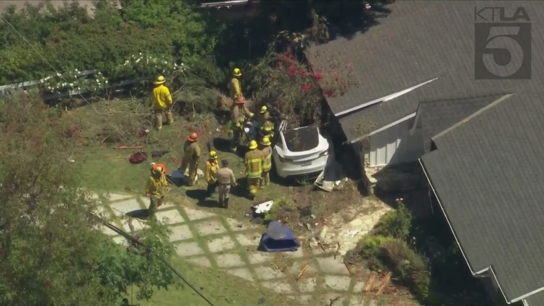 A Tesla crashed into a home in Rolling Hills on Aug. 30, 2022. (KTLA)