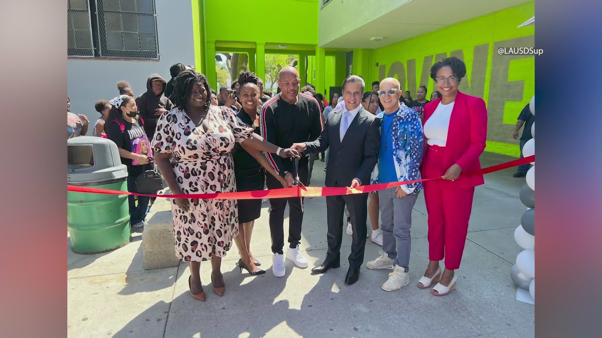 Dr. Dre and Jimmy Iovine cut the ribbon of the Iovine and Young Center