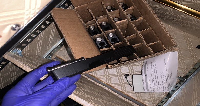 This photo provided by the Los Angeles Police Department shows gun components seized in a search warrant served on Sept. 8, 2022.