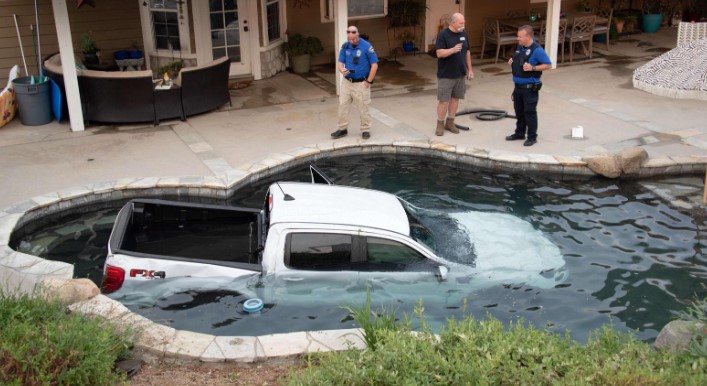 A pickup truck ended up in a backyard pool in Menifee on Sept. 8, 2022. (Menifee Police Department)