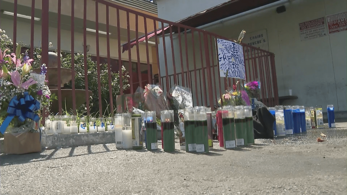 A memorial for PnB Rock grows outside of a South L.A. Roscoe's Chicken and Waffles on Sept. 13, 2022. (KTLA)