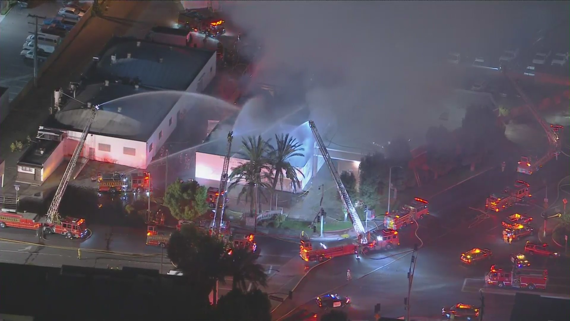 Crews tackle massive fire engulfing commercial building in Bell Gardens on Sept. 23, 2022.