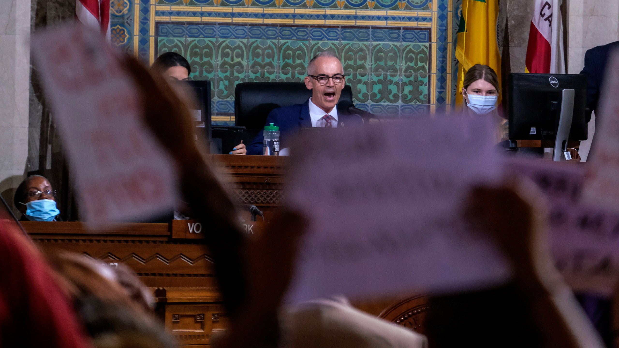 Interim Los Angeles City Council President Mitch O'Farrell, rear center, speaks before the cancellation of the Los Angeles City Council meeting on Oct. 12, 2022. (Ringo H.W. Chiu/Associated Press)