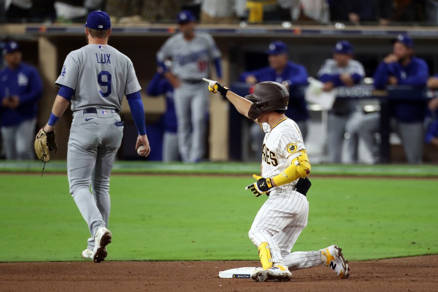 Ha-Seong Kim of the San Diego Padres celebrates after hitting a RBI double during the seventh inning against the Los Angeles Dodgers in Game 4 of the National League Division Series at Petco Park on Oct. 15, 2022, in San Diego. (Denis Poroy/Getty Images)