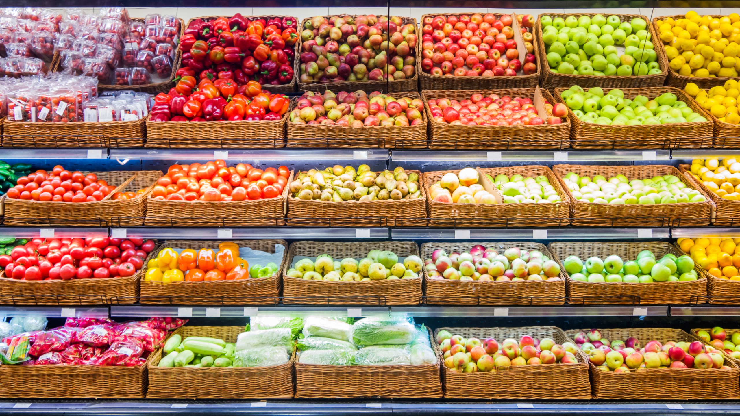 Fresh fruits and vegetables on shelf in supermarket