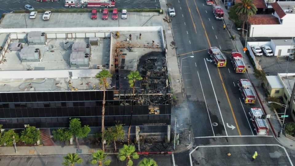 Three-alarm fire engulfs an office building in San Bernardino on Oct. 8, 2022.