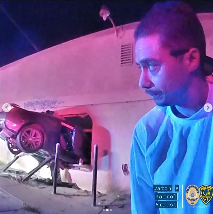 A photo from the Riverside Police shows the aftermath of a car thief launching a stolen car into the side of a building in Riverside on Oct. 19, 2022.