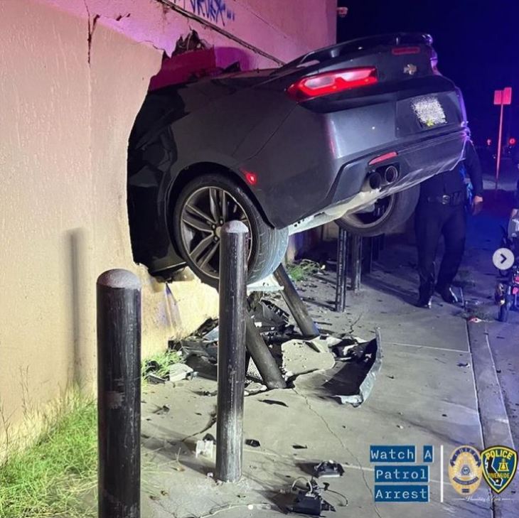 A photo from the Riverside Police shows the aftermath of a car thief launching a stolen car into the side of a building in Riverside on Oct. 19, 2022.