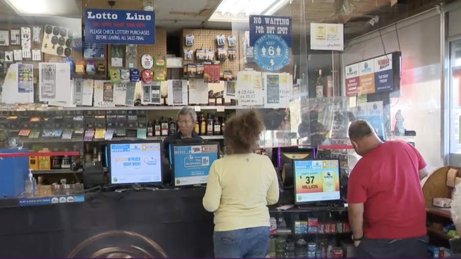 Lottery players flocked to Bluebird Liquor in Hawthorne as the Powerball topped $800 million on Oct. 29, 2022 (KTLA)