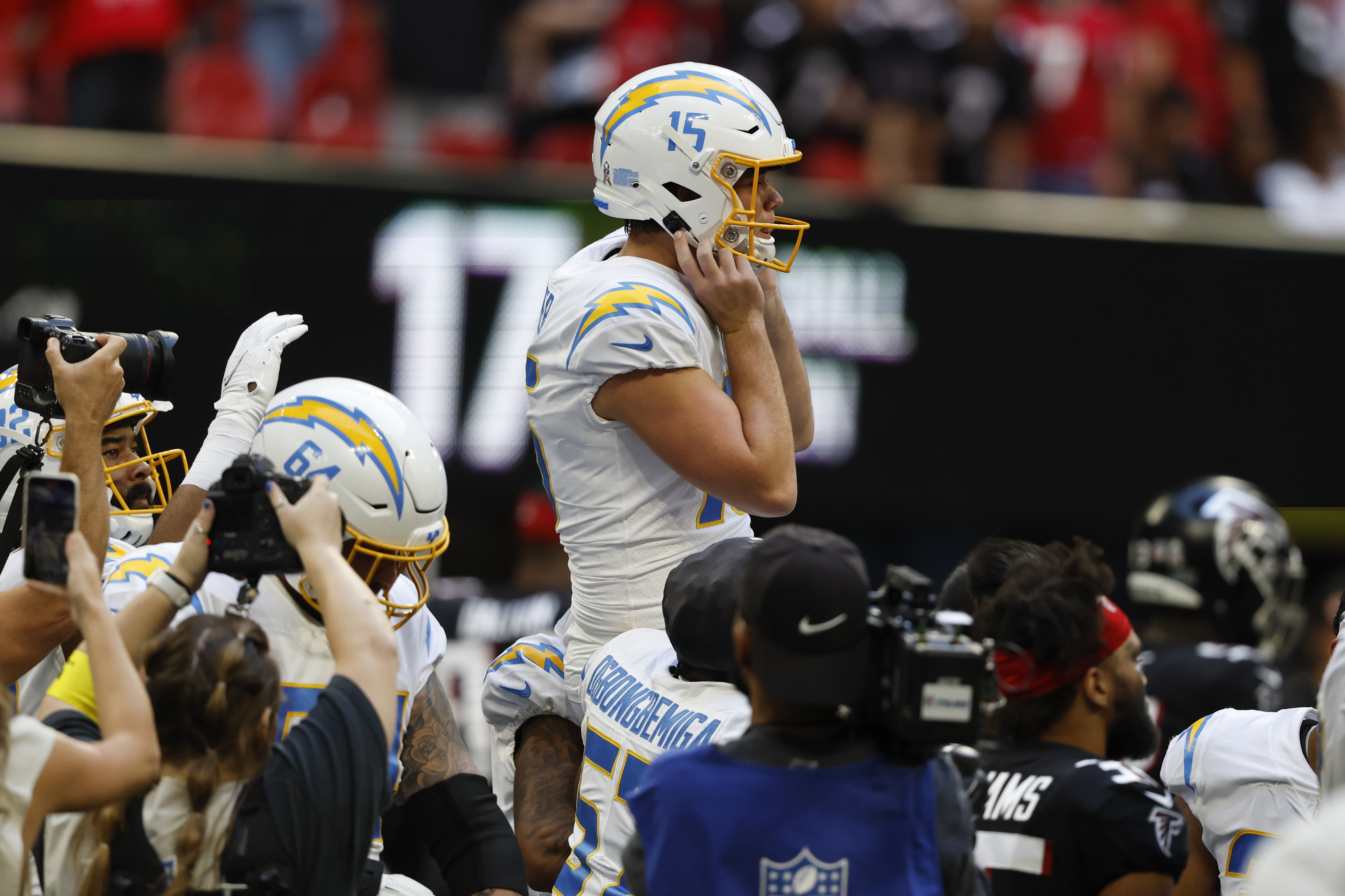 Los Angeles Chargers place kicker Cameron Dicker celebrates after kicking a 37-yard field goal on the final play of an NFL football game against the Atlanta Falcons, Sunday, Nov. 6, 2022, in Atlanta. The Chargers won 20-17. (AP Photo/Butch Dill)