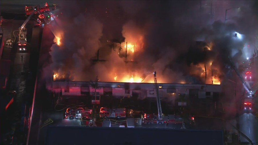 A second-alarm fire burned in Huntington Park on Nov. 22, 2022. (KTLA)