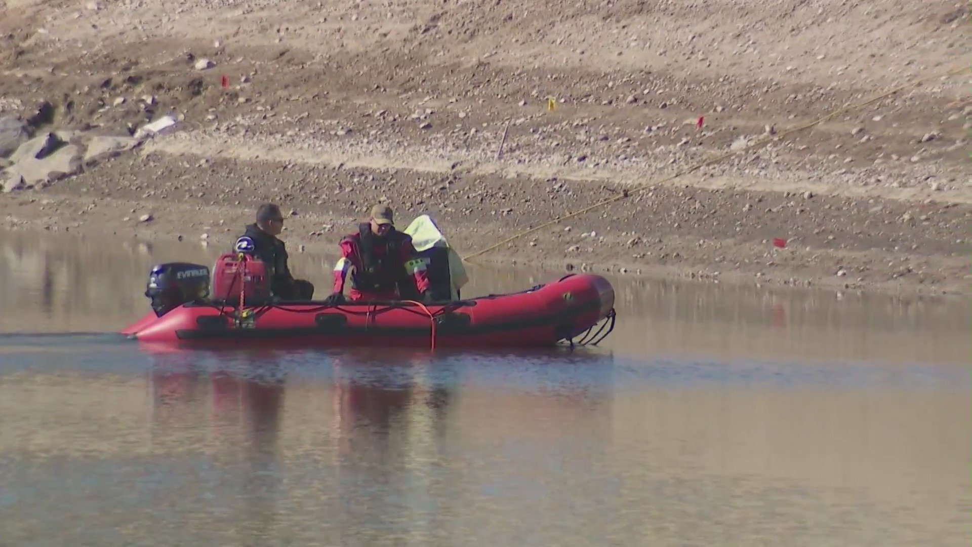 SBCS dive teams search for four unaccounted people washed away in an Ontario wash amid heavy rains. (KTLA)