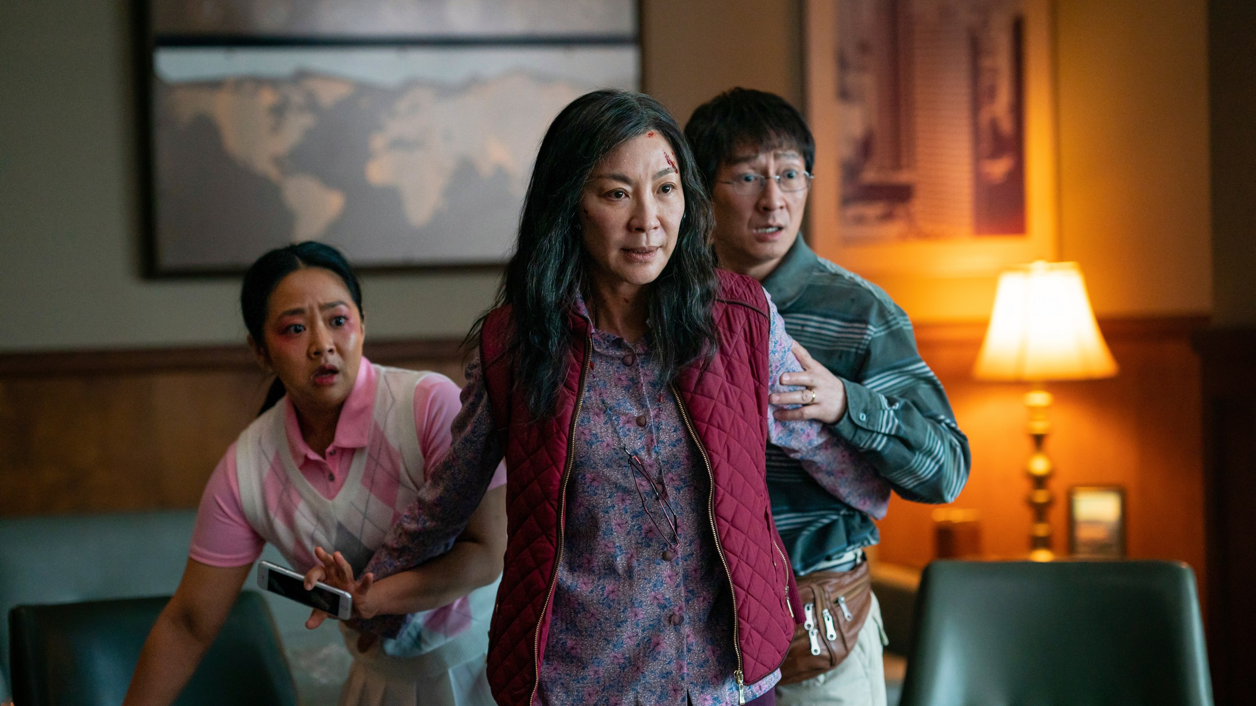 This image released by A24 Films shows, from left, Stephanie Hsu, Michelle Yeoh and Ke Huy Quan in a scene from, "Everything Everywhere All At Once." (Allyson Riggs/A24 Films via AP)