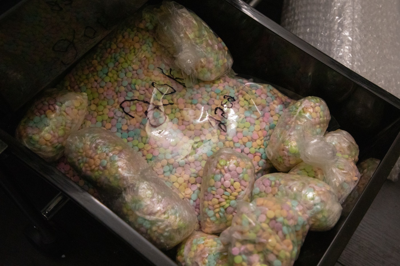 Rainbow-colored pills allegedly containing fentanyl were seized during a federal operation in November 2022. (FBI)