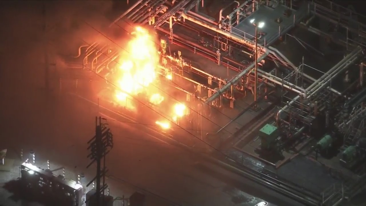 Crews are working to extinguish a fire that ignited at a Chevron oil refinery in El Segundo on Nov. 8, 2022. (KTLA)