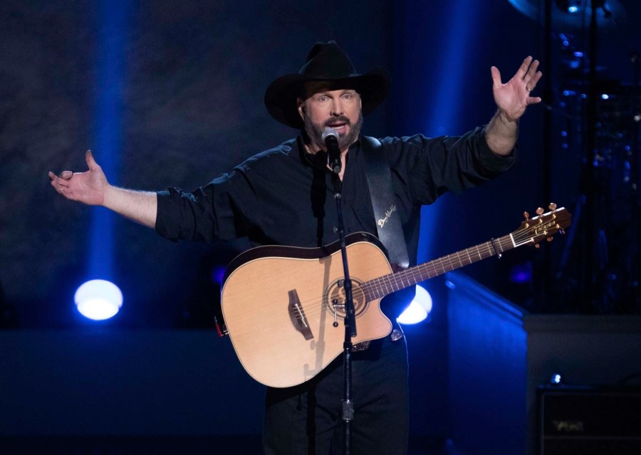 In this March 4, 2020, file photo, country star Garth Brooks performs on stage during the 2020 Gershwin Prize Honoree's Tribute Concert at the DAR Constitution Hall in Washington. (Brent N. Clarke/Invision/AP)