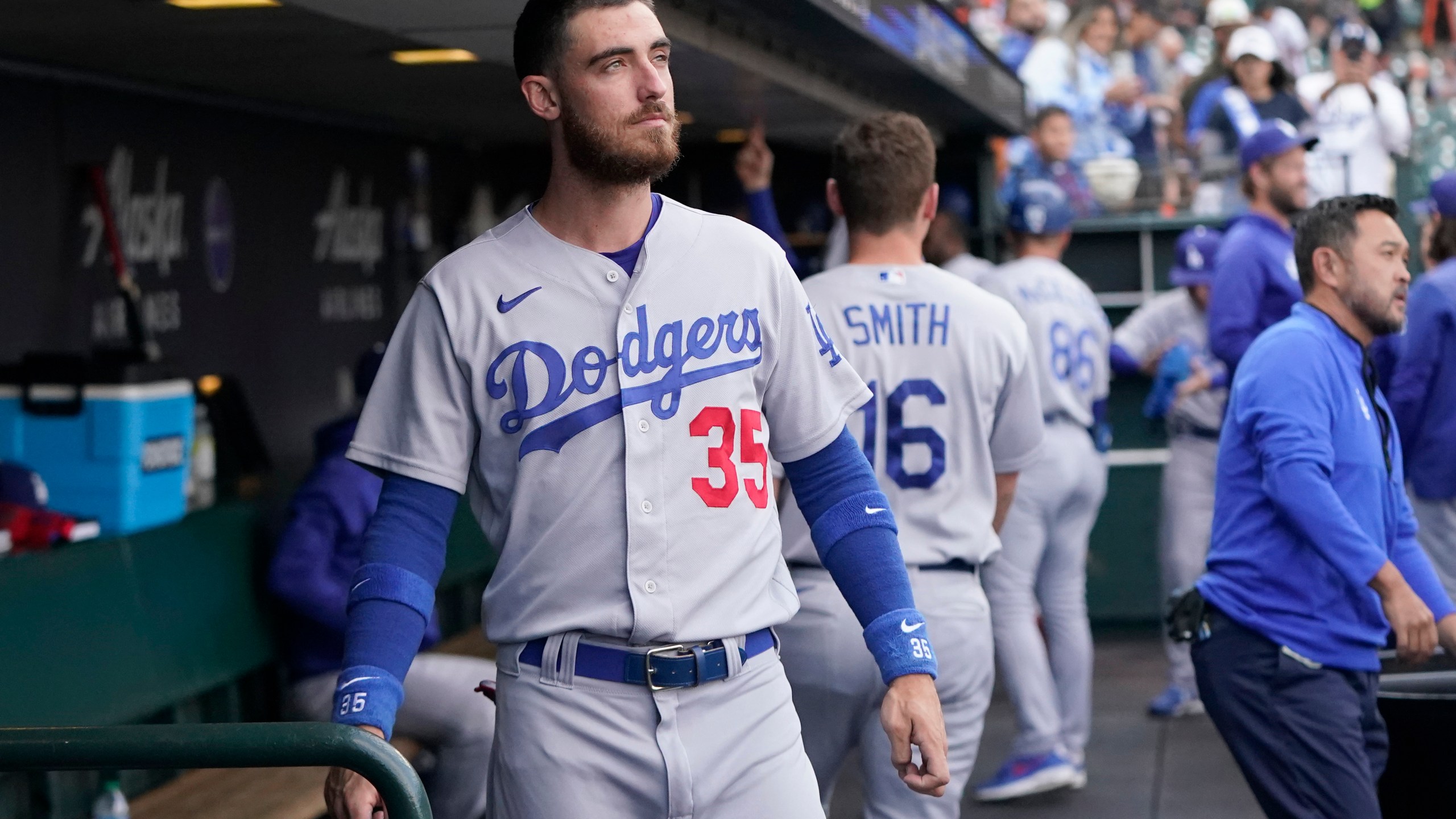 Los Angeles Dodgers' Cody Bellinger stands in the dugout before the team's baseball game against the San Francisco Giants on Aug. 2, 2022. (Jeff Chiu/Associated Press)