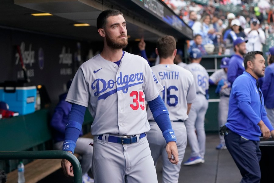 Los Angeles Dodgers' Cody Bellinger stands in the dugout before the team's baseball game against the San Francisco Giants on Aug. 2, 2022. (Jeff Chiu/Associated Press)