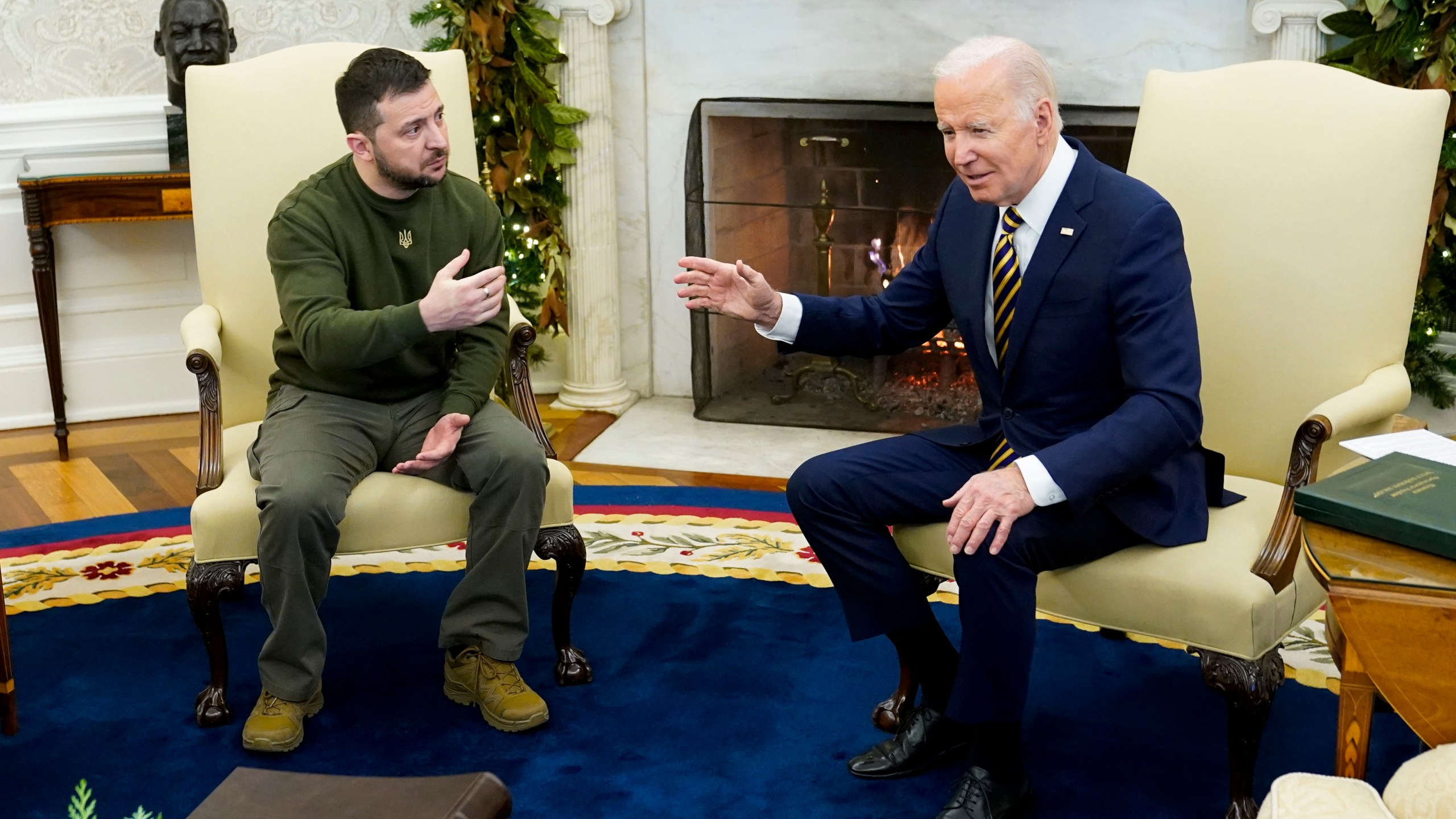 President Joe Biden speaks with Ukrainian President Volodymyr Zelenskyy as they meet in the Oval Office of the White House on Dec. 21, 2022. (Patrick Semansky/Associated Press)