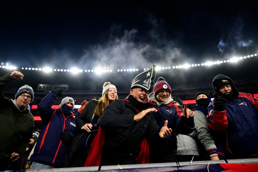 If an NJ.Bet survey is right, these Patriots fans are likely mocking the Buffalo Bills and their supporters on Dec. 1, 2022, in Foxborough, Massachusetts. (Billie Weiss/Getty Images)