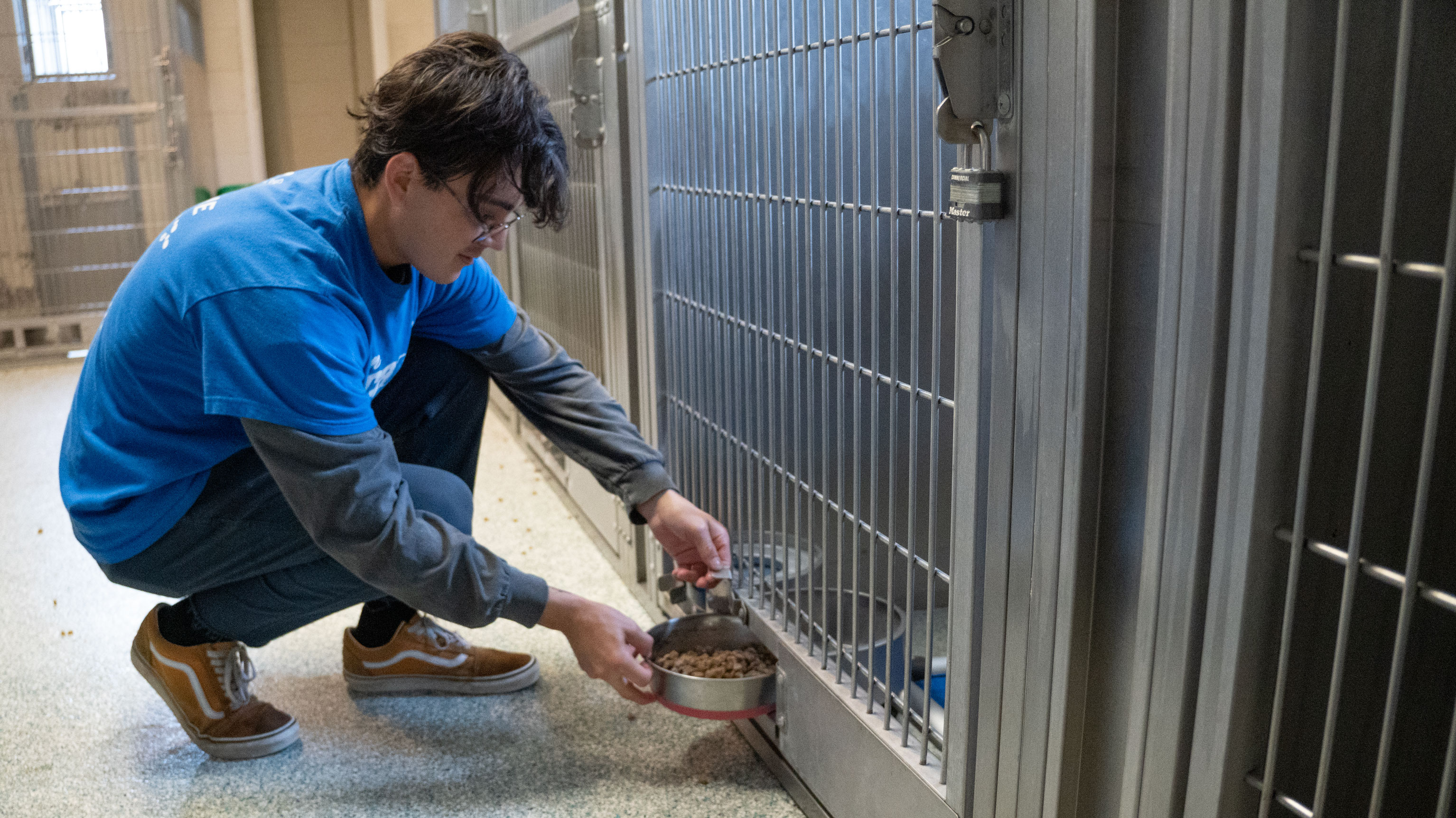 A shelter worker is seen in an undated photo provided by the Society Society for the Prevention of Cruelty to Animals Los Angeles on Dec. 5, 2022.