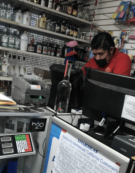 Juventino Reyes Guerrero operating the licensing terminal at Lizette’s Market in this undated photo (Ventura County District Attorney's Office/California Fish and Wildlife)