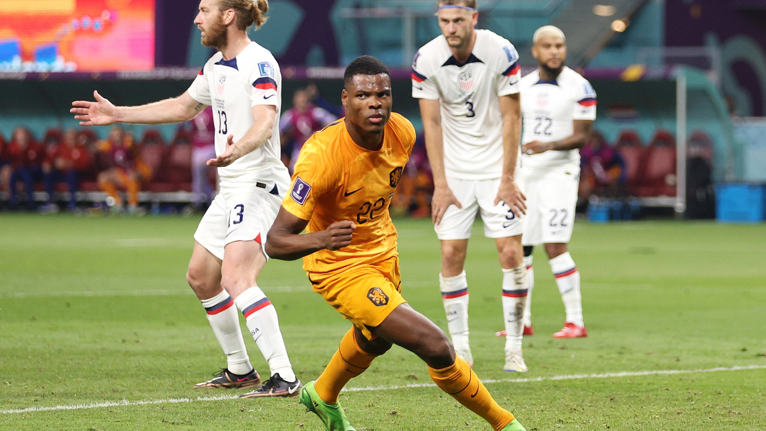 Denzel Dumfries of Netherlands celebrates after scoring the team's third goal during the FIFA World Cup Qatar 2022 Round of 16 match between Netherlands and USA at Khalifa International Stadium on Dec. 3, 2022, in Doha, Qatar. (Richard Heathcote/Getty Images)