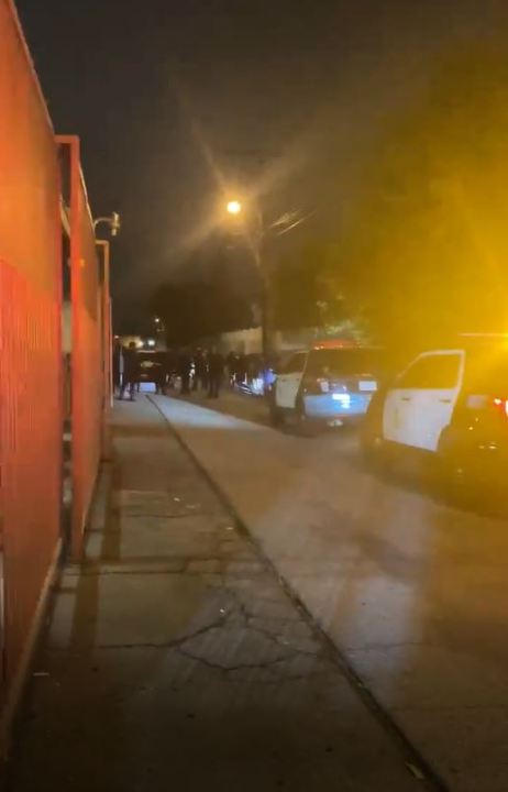 Citizen video shows a cordoned off alleyway after a fatal shooting in Valley Glen on Dec. 28, 2022.