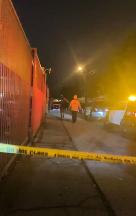 Citizen video shows a cordoned off alleyway after a fatal shooting in Valley Glen on Dec. 28, 2022.