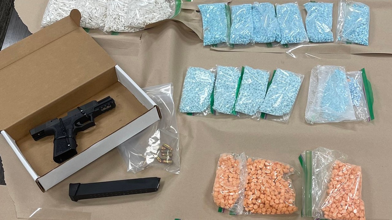 Drugs and a handgun seized by a special investigations unit is seen in an image provided by the Newport Beach Police Department on Dec. 15, 2022.