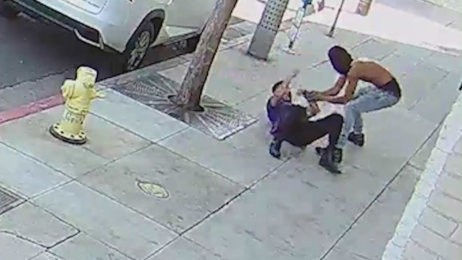 Violent "bank jugging" robbery caught on camera. (KTLA)