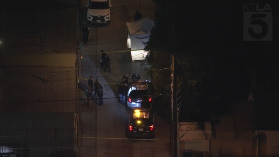 Sky5 images show a cordoned off alleyway after a fatal shooting in Valley Glen on Dec. 28, 2022.