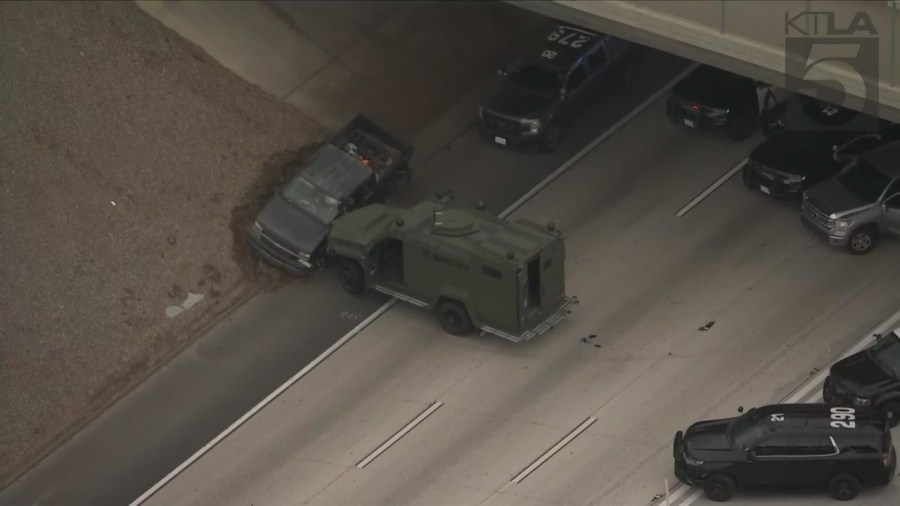 Image from Sky5 shows the end of a pursuit on the southbound 15 Freeway in Norco involving the suspect in a deadly shooting with a Riverside County Sheriff's deputy on Dec. 29, 2022