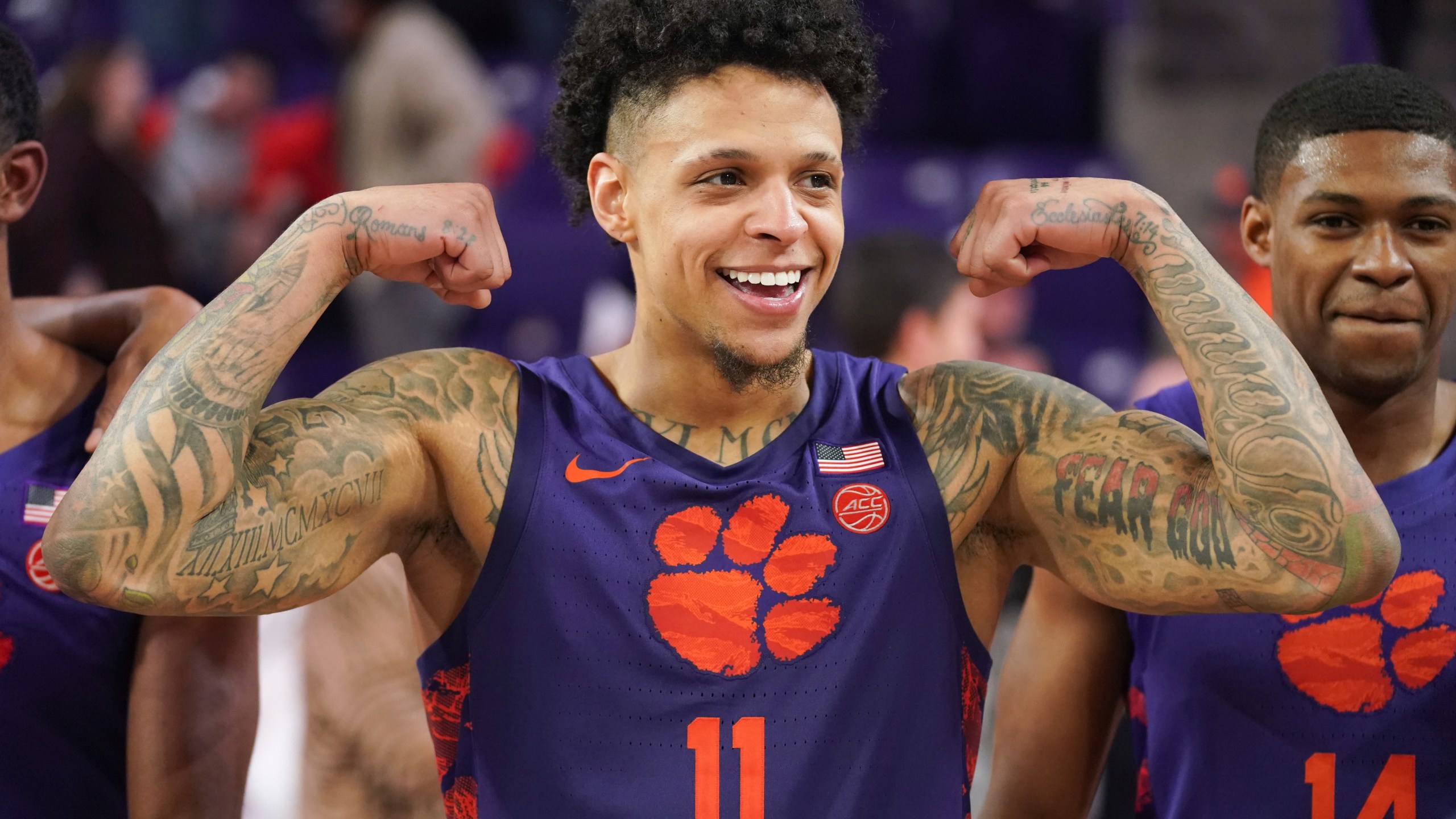 Clemson guard Brevin Galloway flexes after an NCAA college basketball game against Georgia Tech Tuesday, Jan. 24, 2023, in Clemson, S.C. Clemson won 72-51. (AP Photo/Sean Rayford)