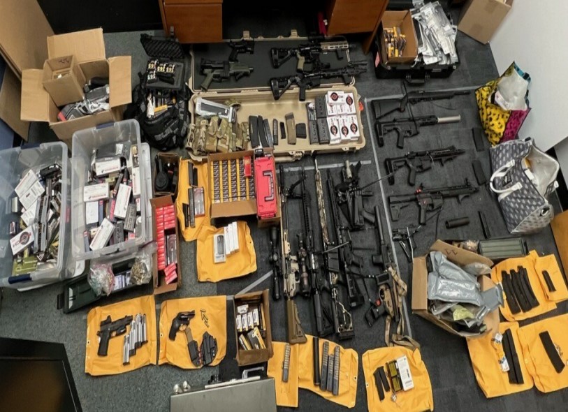 The Los Angeles Police Department on Jan. 5, 2023, released a photo of the cache of firearms they seized the day before.