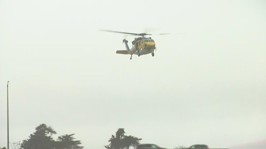 A helicopter circled overhead of a Ventura riverbed rescue on Jan. 9, 2023.